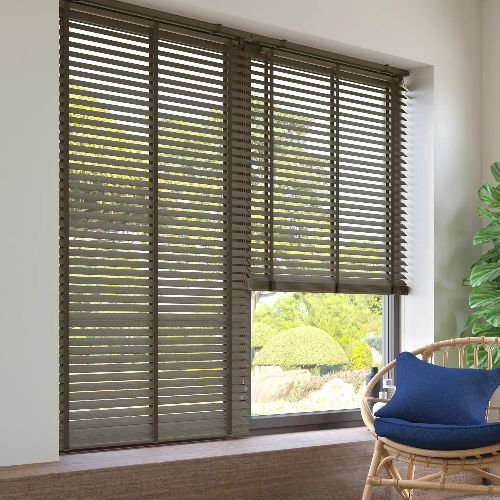 Brown window blinds in sunlit room